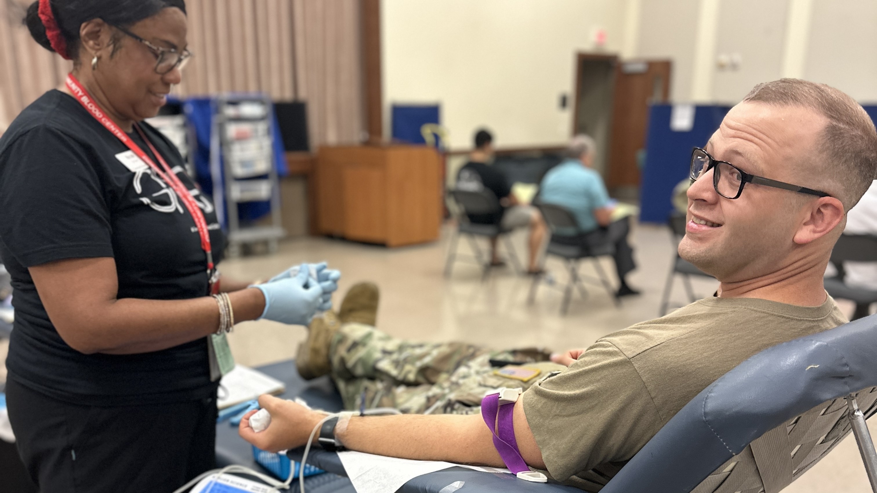 service member donates blood