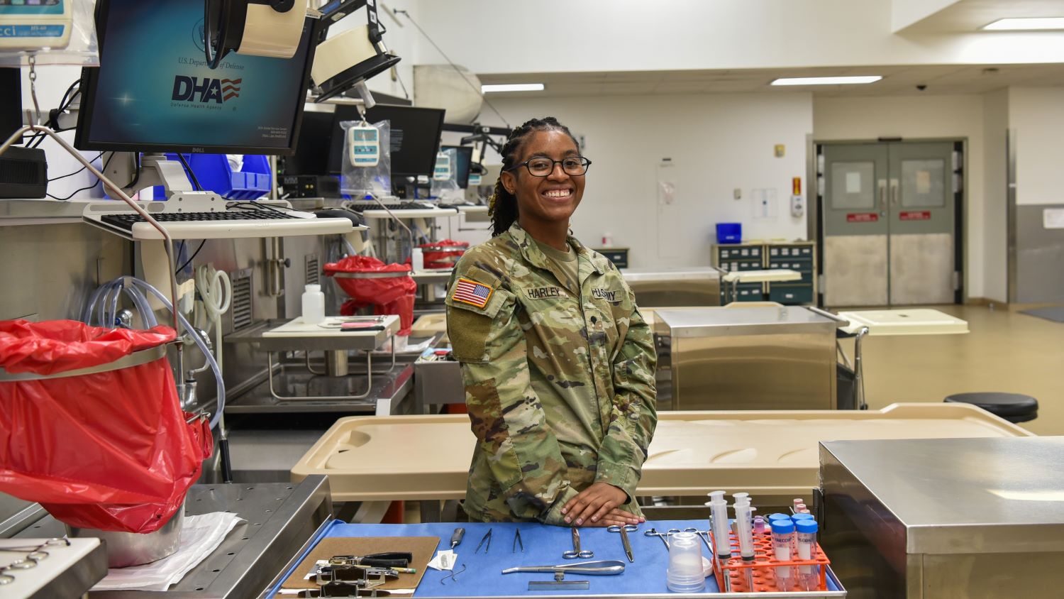 Staff member in the mortuary smiling