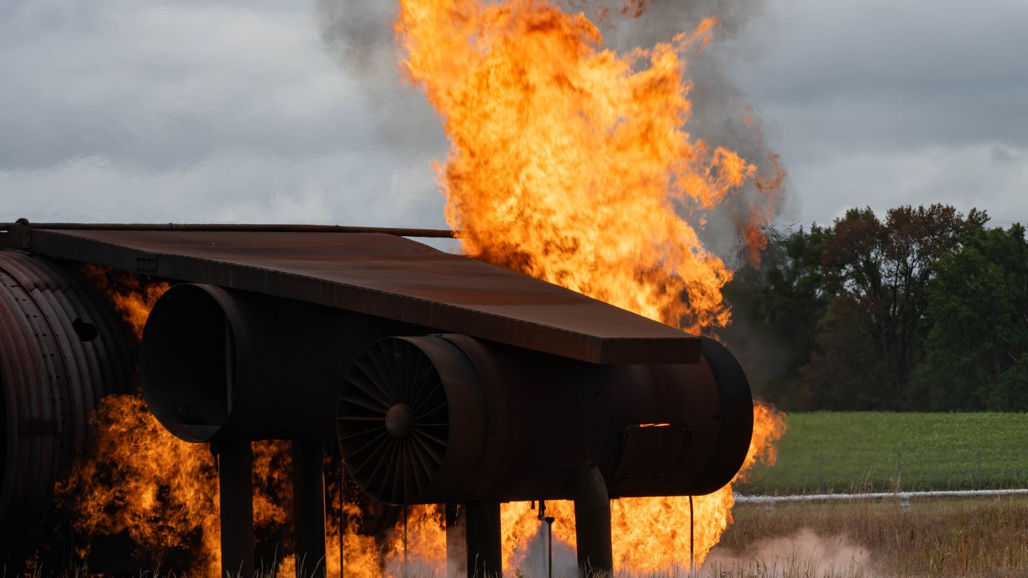Aircraft wing on fire during training exercise for recovery specialists