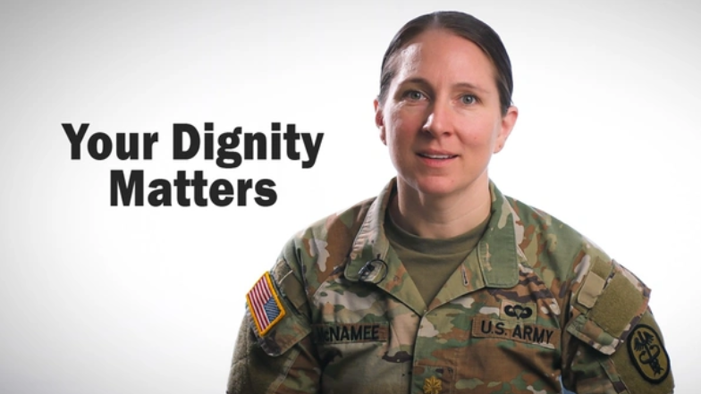 Female soldier in uniform with the words "Your Dignity Matters."