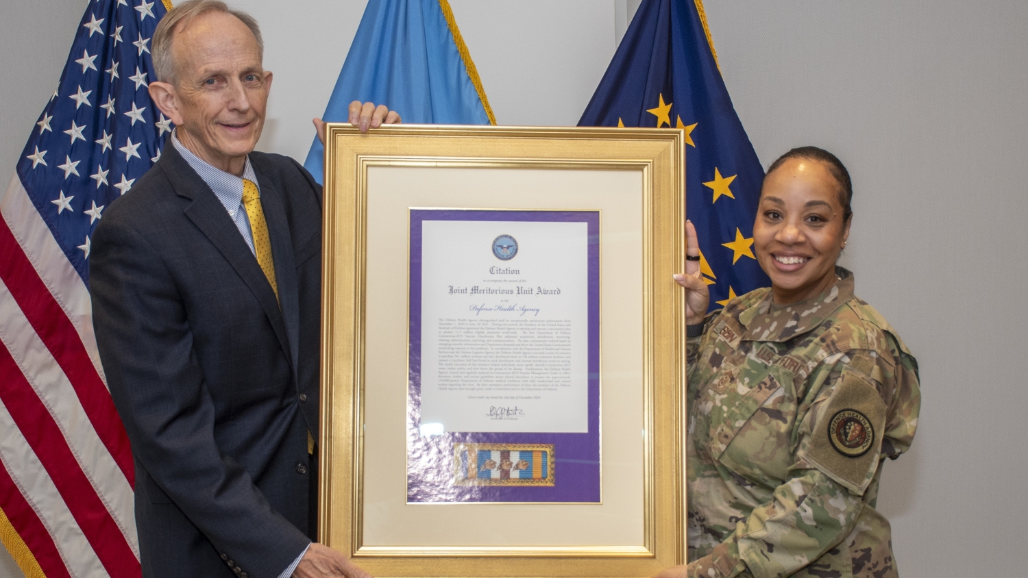 Photo of the agency’s fourth Joint Meritorious Unit Award in its nearly 12-year history.