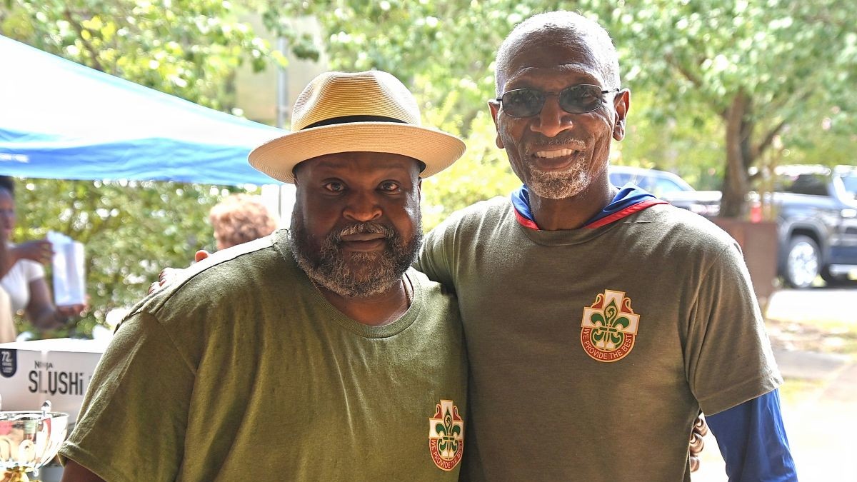 Photo By Jean Graves | Lakobi Hopson, left, lead clinical systems trainer, and Akeem Richard, information technology specialist and systems administrator, pose during Bayne-Jones Army Community Hospital’s Organizational Day at Alligator Lake, Fort Polk, Louisiana, Sept. 3, 2026. Both work in BJACH’s Department of Information Management. The hospital encourages beneficiaries to discuss colorectal cancer screening needs with their primary care manager. 