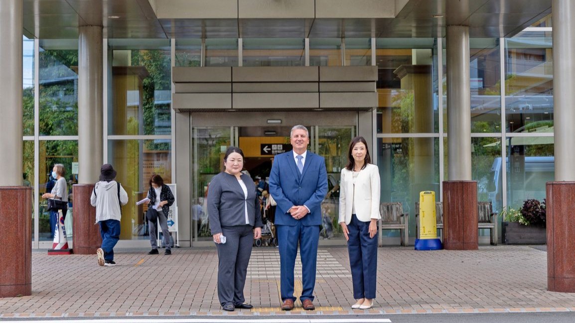 Photo By Daniel Taylor | KAMAKURA, Japan (Sept. 14, 2026) — Ms. Eriko Tosa, left, of U.S. Navy Medicine Readiness and Training Command Yokosuka Referral Management; Capt. Joshua A. Miller, center, commanding officer, U.S. Navy Medicine Readiness and Training Command Yokosuka, and director, U.S. Naval Hospital Yokosuka (USNH Yokosuka); and Dr. Mako Wada, a Japanese fellow with USNH Yokosuka, pose for a photo during an orientation visit to Shonan Kamakura General Hospital. The visit strengthened coordination, communication and collaboration between USNH Yokosuka and host-nation medical partners who provide specialty care, diagnostic services and other care to eligible beneficiaries throughout the Kanto region. (U.S. Navy photo by Daniel Taylor/USNMRTC Yokosuka Public Affairs)
