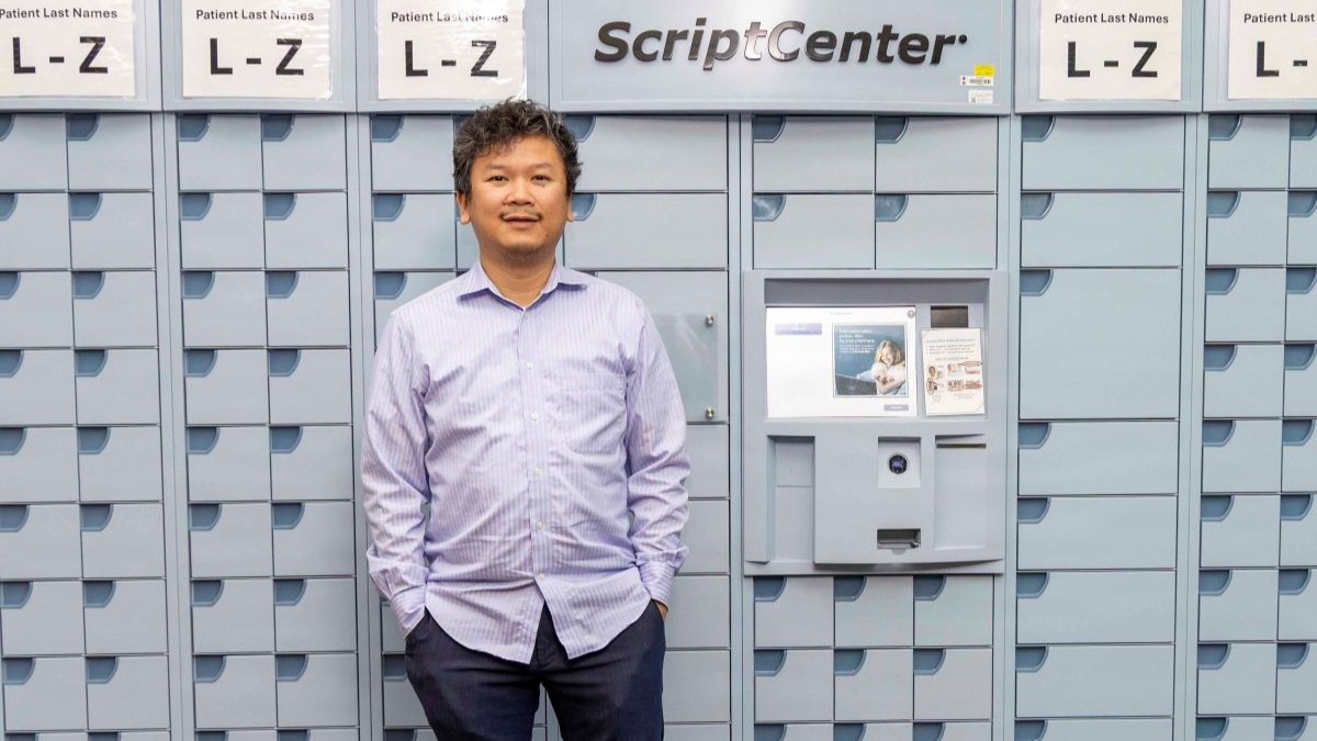 Photo By Roan Smith | Dr. Chuong Do, an inpatient pharmacist at Walter Reed National Military Medical Center, poses for a portrait in front of a ScriptCenter prescription kiosk in the pharmacy department, Bethesda, Md., Oct. 26, 2026. Do was named the Defense Health Agency Inpatient Pharmacist of the Year and National Capital Region Inpatient Pharmacist of the Year. (DOW photo by Roan Smith)