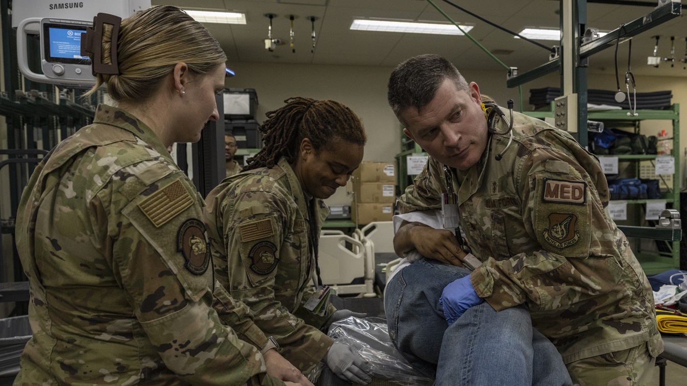 U.S. Air Force Airmen assigned to the 35th Medical Group simulate medical treatment for a casualty actor during an Emergency Management exercise at Misawa Air Base, Japan, Aug. 28, 2024. Routine exercises enable the 35th Fighter Wing to assess and enhance its emergency management capabilities, preparing it to address emerging threats and challenges while deterring adversaries by demonstrating its readiness and adaptability. (U.S. Air Force photo by Airman 1st Class Patrick Boyle)