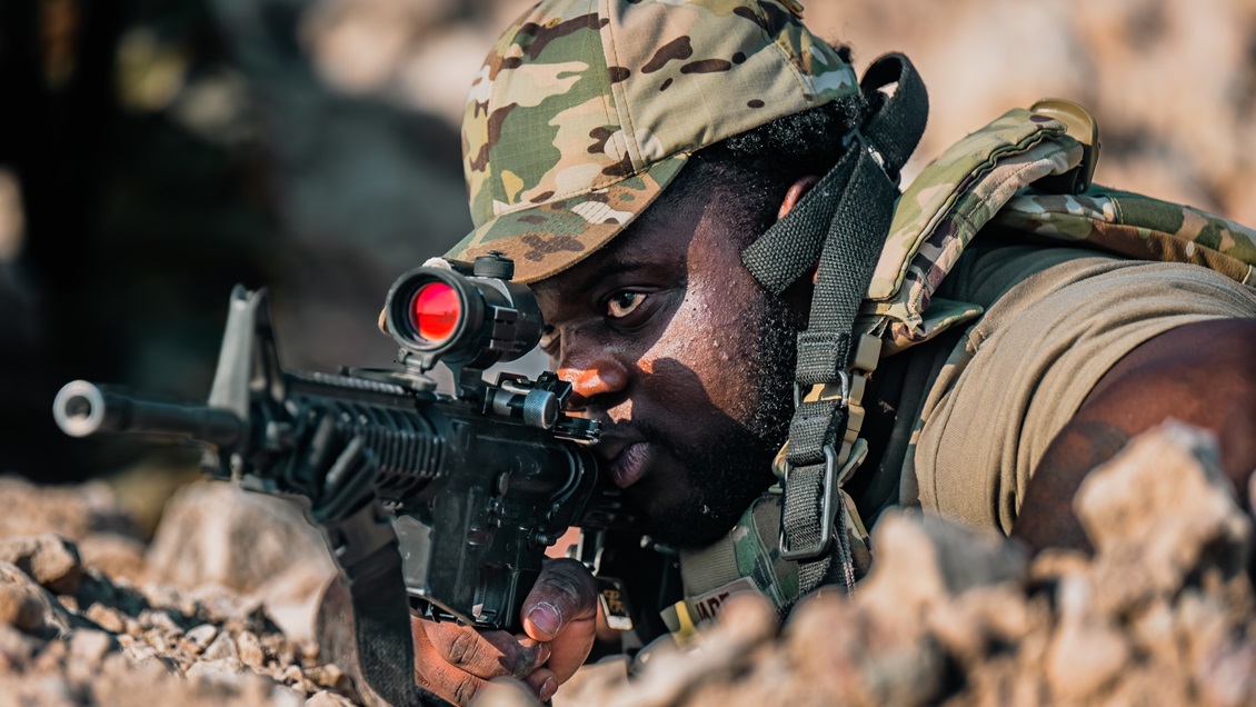 U.S. Air Force Senior Airman Foday Ware, 379th Expeditionary Force Support Squadron services specialist, holds an M4 Carbine during a Tactical Leadership Course within the U.S. Central Command area of responsibility, Jan. 16, 2025. During the two-week course, students conducted foot and vehicle patrols in an austere environment to detect and deter simulated threats. (U.S. Air Force photo by Airman 1st Class Zeeshan Naeem)