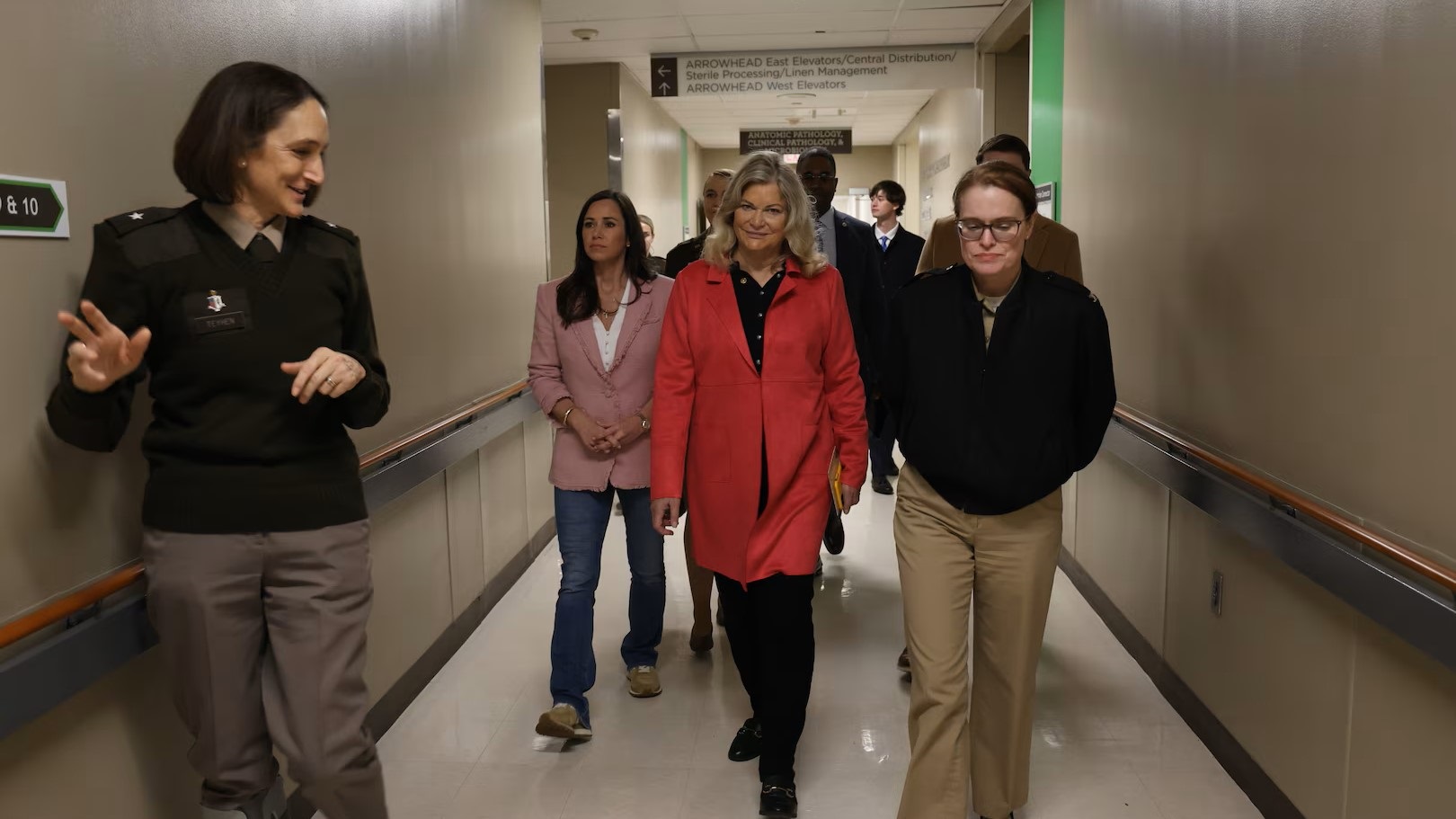 Women walking down a hospital hallway