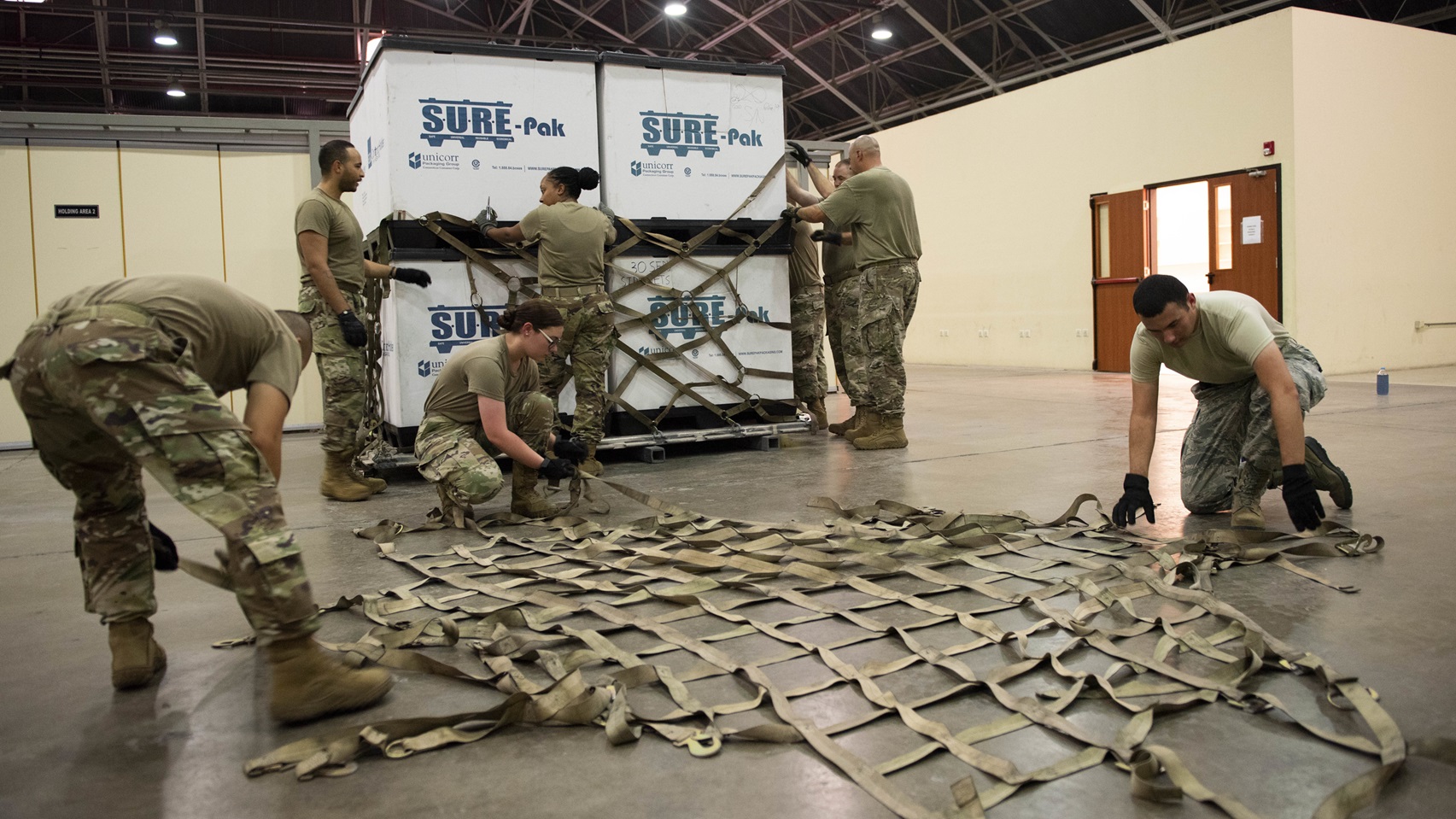 U.S. Air Force Airmen from the 39th Medical Support Squadron Medical Logistics Flight train on how to load an aircraft pallet during cargo build-up training with 39th Logistics Readiness Squadron Airmen at Incirlik Air Base, Turkey, Aug. 19, 2020. Medical Logistics Airmen differentiate themselves by maintaining a comprehensive understanding of supply chain management due to the need for having eyes on all the moving parts of the process. (U.S. Air Force photo by Staff Sgt. Ryan Lackey)