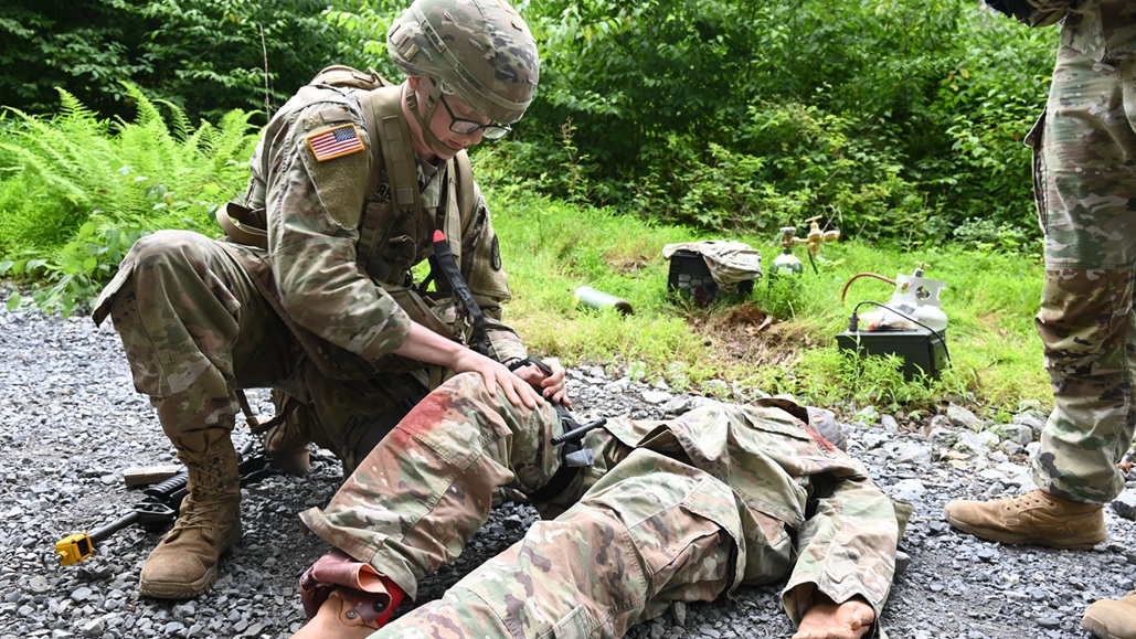 Spc. Raymond Torrisi, Rader U.S. Army Health Clinic, assists with hoist operations during the Fort Meade Medical Department Activity third quarter Best Leader Competition at Fort Indiantown Gap, Pennsylvania, July 7.