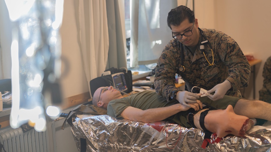 U.S. Navy Hospital Corpsman 2nd Class Pabalo Pellecer, a native of Grandville, Michigan, applies a pulse oximeter to a simulated amputee during a medical training exercise in preparation for Exercise Freezing Winds 24 on Dragsvik, Finland, Nov. 19, 2024. 