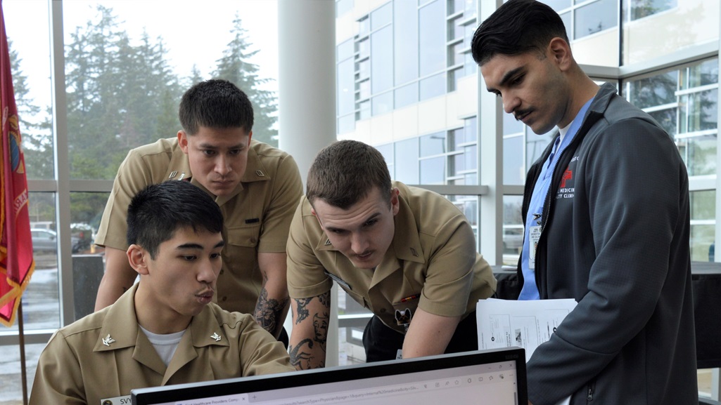 Corpsmen Up for those in need…hospital corpsmen assigned to Naval Hospital Bremerton prepare to assist Internal Medicine Clinic patients with transitioning to a civilian provider in the surrounding network.