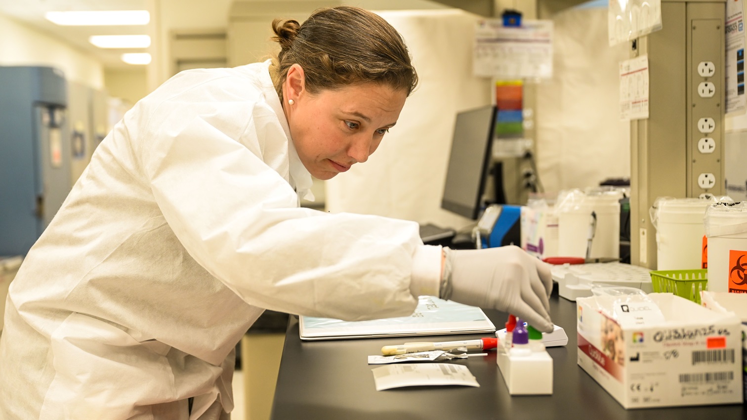 Tech. Sgt. Christina Swope, 90th Medical Group medical laboratory scientist, sorts through a tray of viles at F.E. Warren Air Force Base, Jan. 28, 2025. The biomedical laboratory is one of the 13 Air Force Specialty Codes within the Biomedical Science Corps, which is responsible for ensuring the care of military members. (U.S. Air Force photo by Airman 1st Class Mattison Cole)