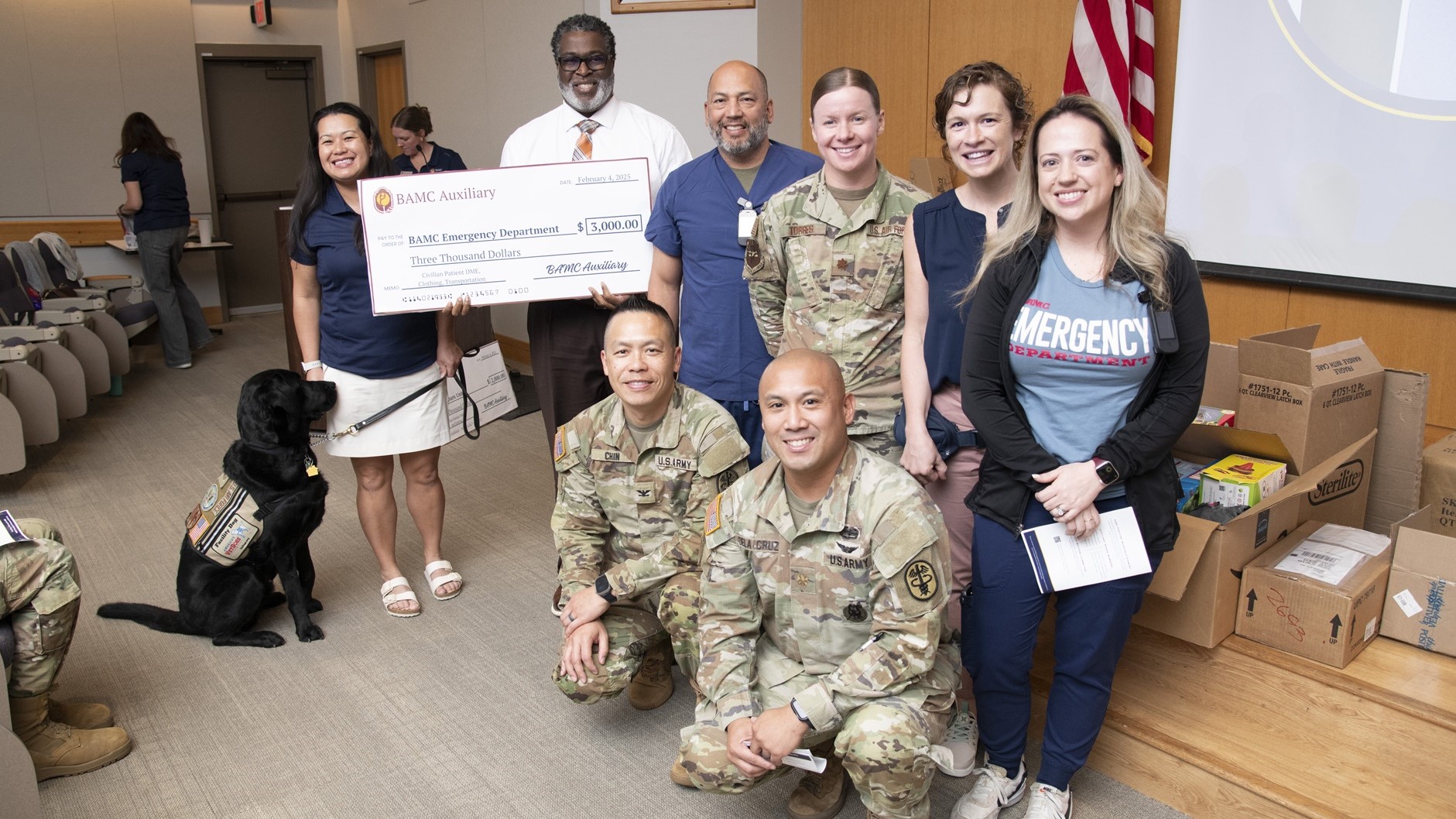 The BAMC Auxiliary presents a grant check to members of Brooke Army Medical Center’s Emergency Department in BAMC’s Carolyn D. Putnam Auditorium, Joint Base San Antonio – Fort Sam Houston, Texas, Feb. 5, 2025. Since 2019, the BAMC Auxiliary has given more than $170,000 worth of items to departments throughout BAMC. (DoD photo by Jason W. Edwards)