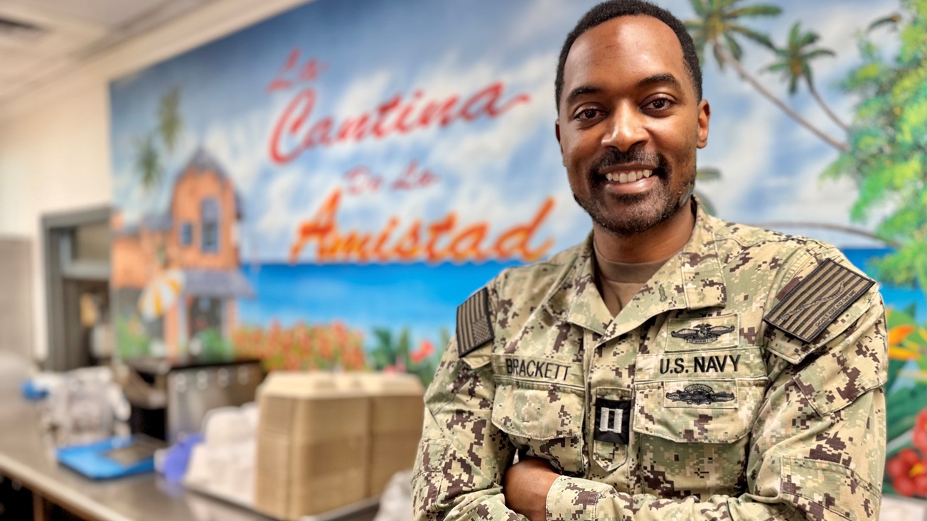 GUANTANAMO BAY, Cuba (April 4, 2025) - Lt. Donte Brackett, a registered dietitian assigned to U.S. Navy Medicine Readiness and Training Command, Guantanamo Bay, is recognized as the U.S. Navy Dietitian of the Year. Brackett works at U.S. Naval Hospital Guantanamo Bay supporting the nutritional health and operational readiness of service members and residents of U.S. Naval Station Guantanamo Bay. (U.S. Navy photo by Emily McCamy/released)