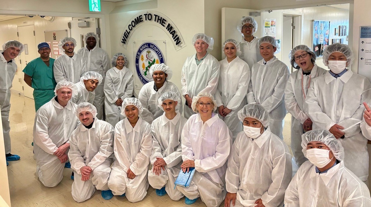 Attendees of the first-ever Asia-Pacific High-Level Sterilization Course pose for a picture during a tour of U.S. Naval Hospital Okinawa. Traditionally held on the U.S. East Coast, this specialized training was made available to forward-deployed medical professionals, eliminating barriers such as funding constraints, time zone differences, and limited access to sterilization resources.