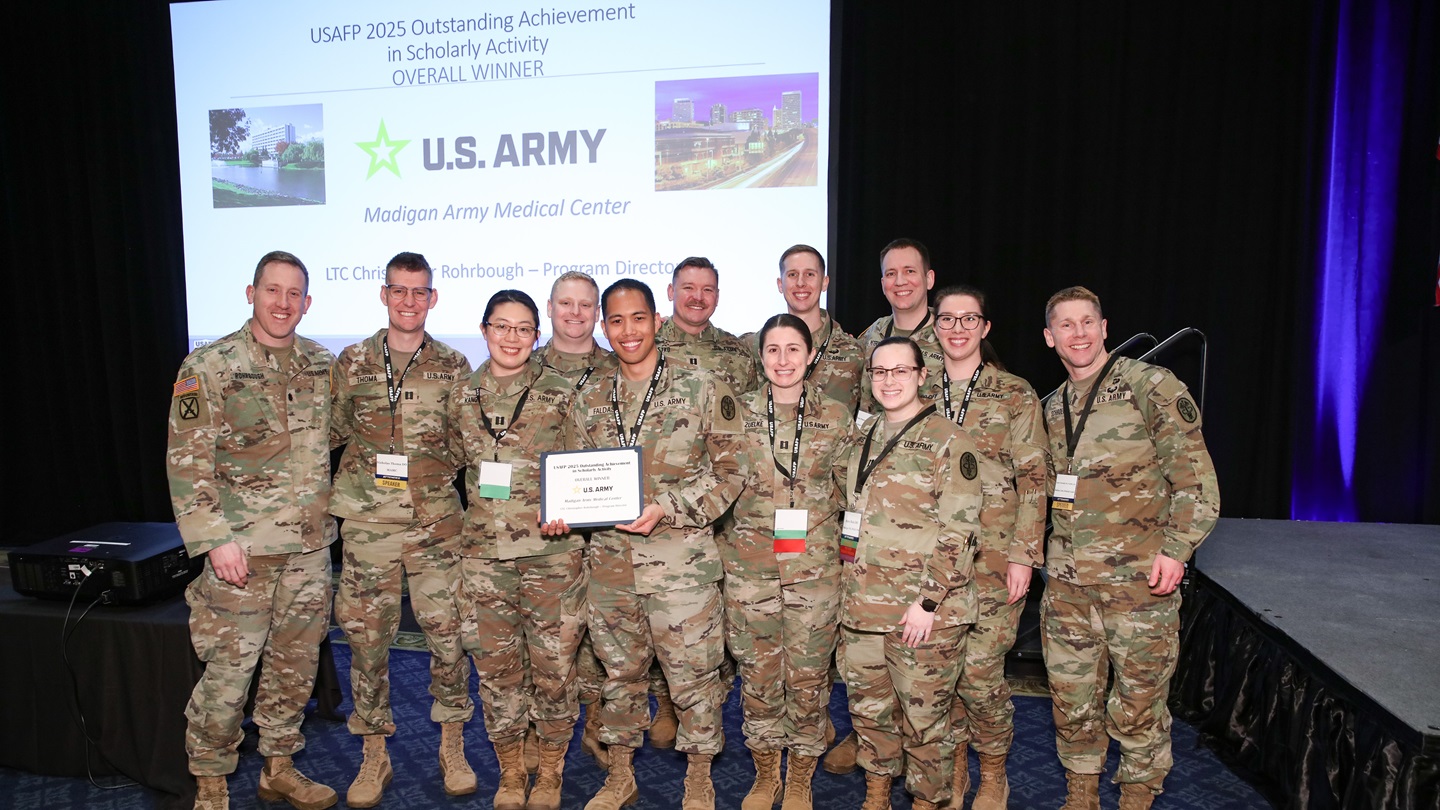 The Madigan Family Medicine Residency Program achieved a remarkable double victory at the annual Uniformed Services Academy of Family Physicians (USAFP) conference. This conference is held annually to showcase achievements in military medicine across the Department of Defense (DoD). The Madigan Family Residency Program was awarded the USAFP 2025 Outstanding Achievement in Scholarly Activity, recognizing it as the top producer of research and scholarly work among all Army, Navy, Air Force, and Coast Guard Family Medicine residencies.