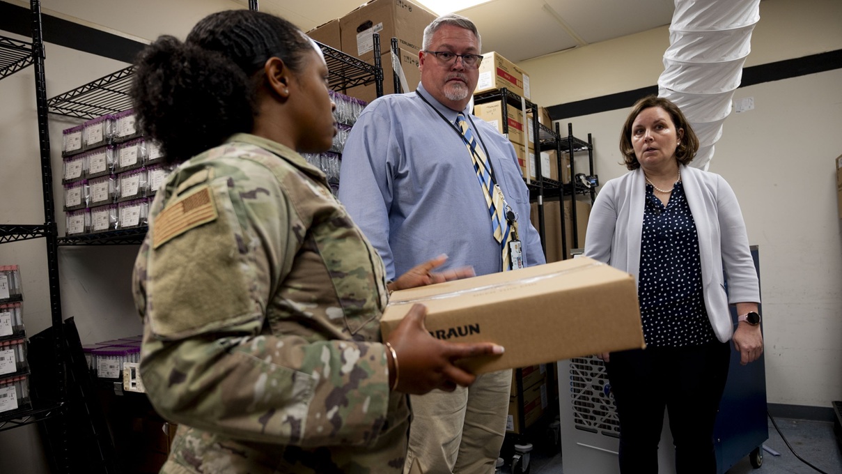 U.S. Army 2nd Lt. Niquanna Perez, left, deputy director of the Armed Services Blood Bank Center - National Capital Region, speaks with Andrew Atkinson, center, and Dr. Kendra Lawrence during a visit at Walter Reed National Military Medical Center - Armed Services Blood Bank, Bethesda, Md., June 3, 2025.