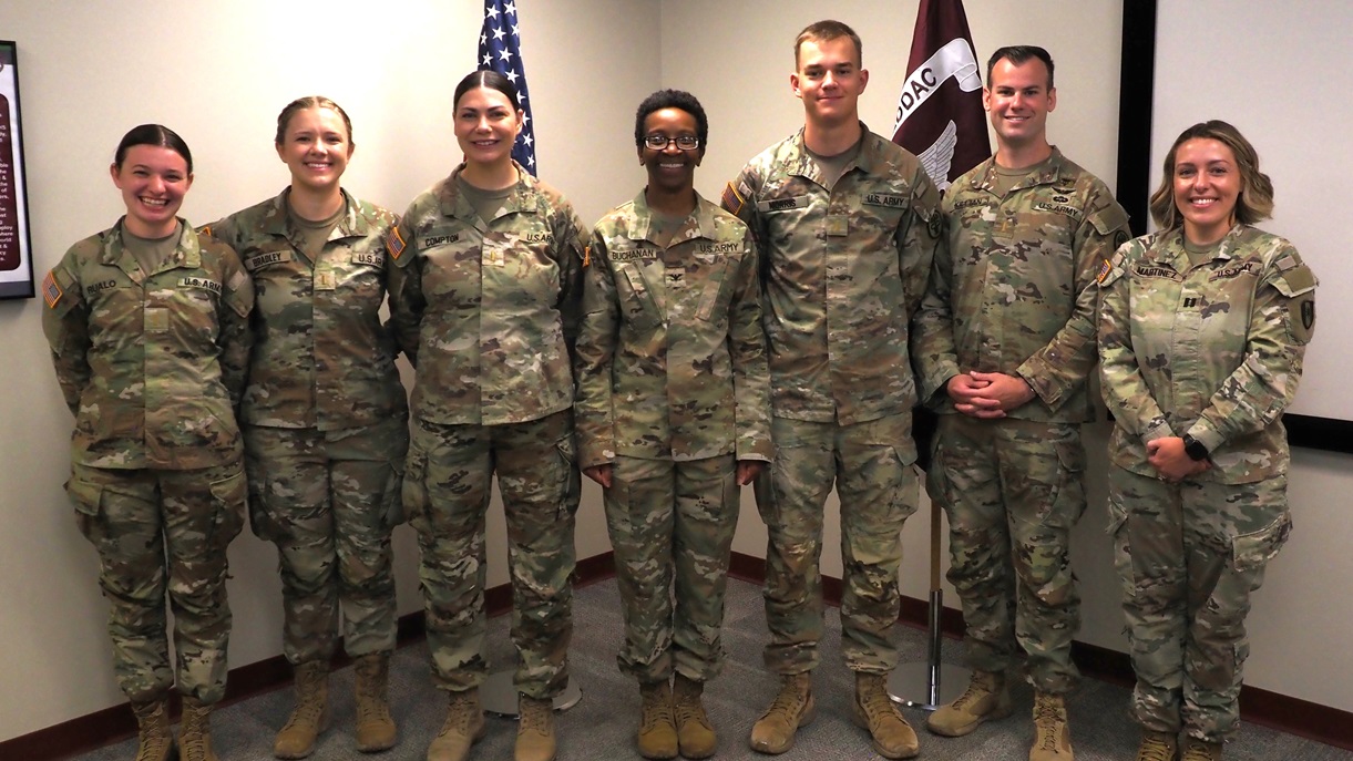 Five of the newest graduates from the Evans Army Community Hospital Clinical Nurse Transition Program pose for a picture with Col. Cynthia Buchanan, the EACH Deputy Commander for Nursing (center), and Capt. Michelle Martinez, the Clinical Nurse Officer in charge of the EACH Family Care Ward (far right).