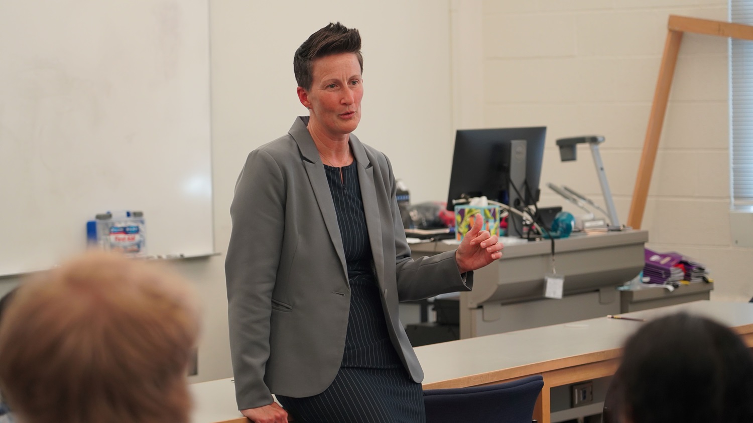 Dr. Carrie Quinn, Deputy to the Commanding General of the Defense Health Agency Research & Development-Medical Research and Development Command, speaks with near-peer mentors participating in the Gains in the Education of Mathematics and Science summer program at Hood College.