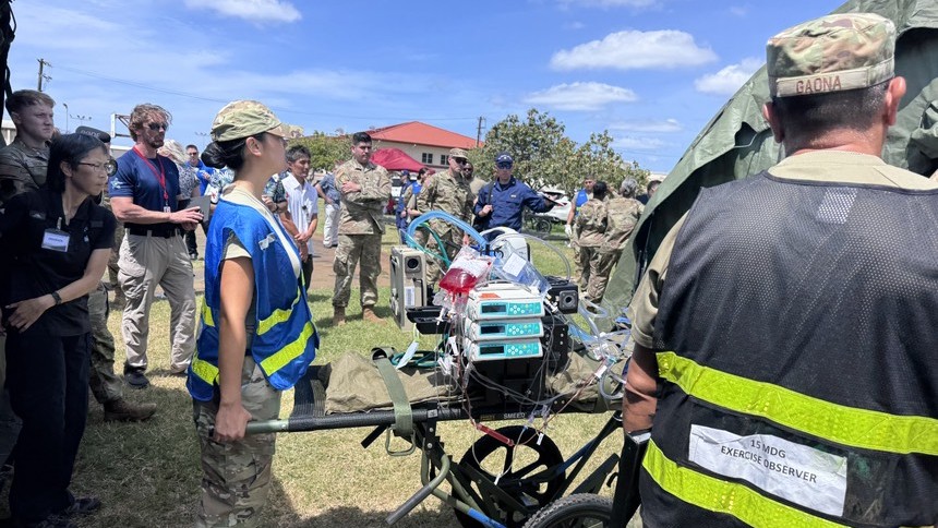 Members of the 15th Medical Group practice the transfer of patients during Exercise Ultimate Caduceus 25 at Joint Base Pearl Harbor-Hickam, Hawaii