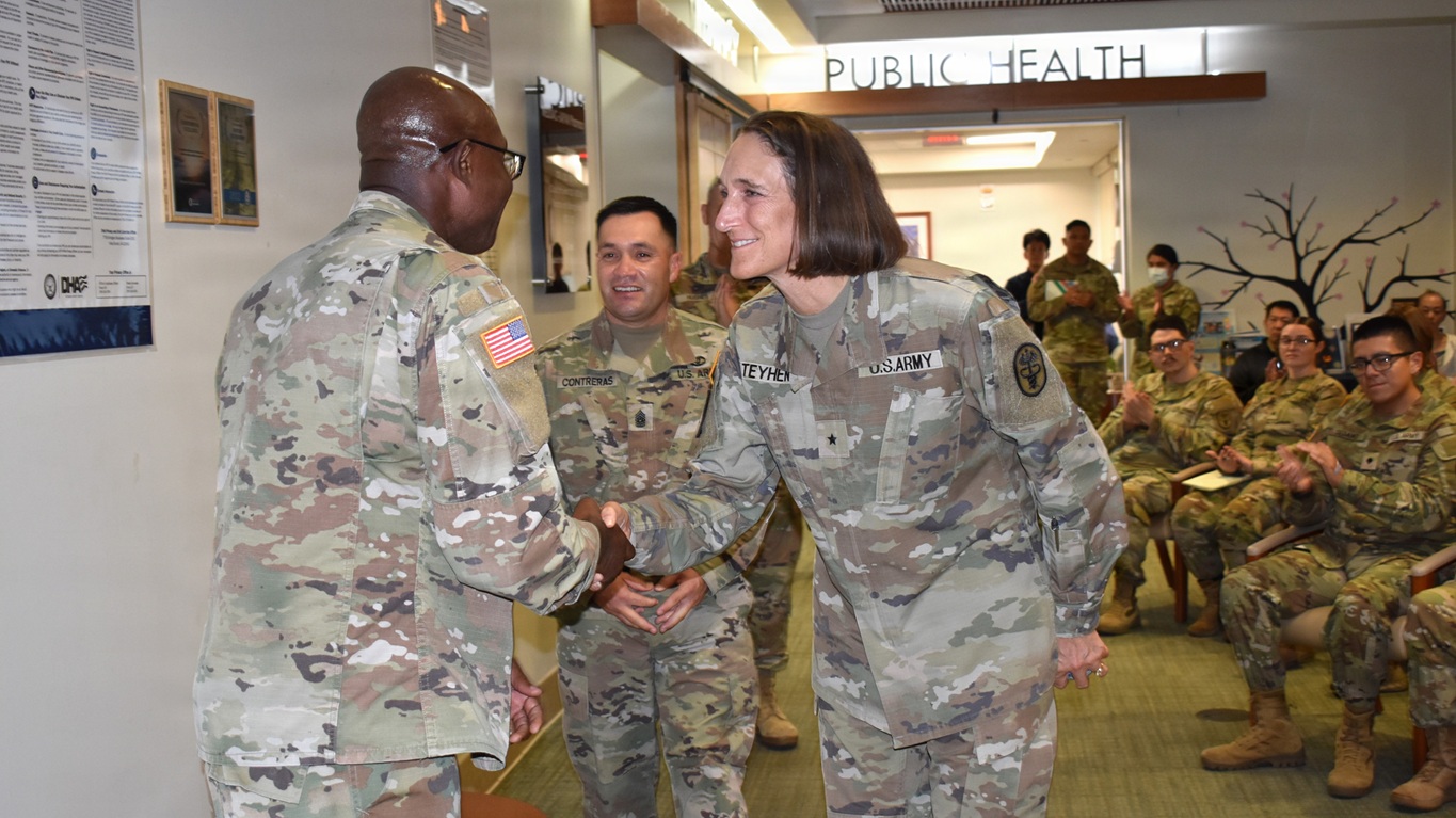 Brig. Gen. Deydre Teyhen recognized Maj. Harrison Sarpong, chief of pharmacy, for his excellence in health care at Brig. Gen. Crawford F. Sams Health Clinic at Camp Zama, Japan, on Sept. 25. 