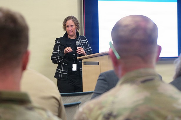 Theresa (Tracie) Lattimore, Deputy Assistant Secretary of War, Office of Health Readiness Policy and Oversight, discusses biosurveillance during the opening plenary session on ‘Enhancing Military Readiness with Biosurveillance’ Sept. 10, 2025. (Defense Health Agency Public Health photo courtesy Armed Forces Health Surveillance Division)