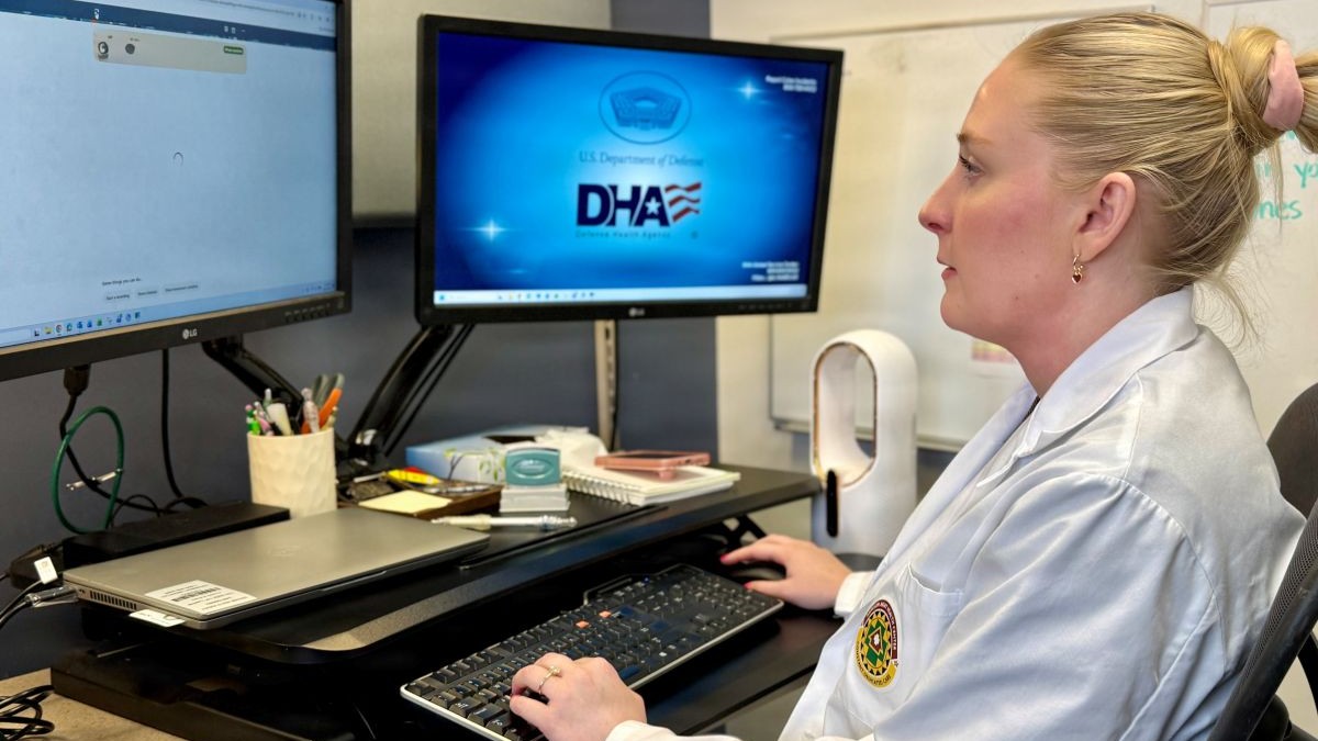 Defense Health Agency Physician Assistant Mikaela Altis logs into the Ambient Listening program to review a patient record at Munson Army Health Center, Fort Leavenworth, Kansas, Aug. 14, 2026. The program uses AI and speech recognition to quietly record and convert doctor-patient conversations into structured medical notes.The secure technology supports health care delivery by helping providers document visits more efficiently, allowing them to focus more attention on their patients.