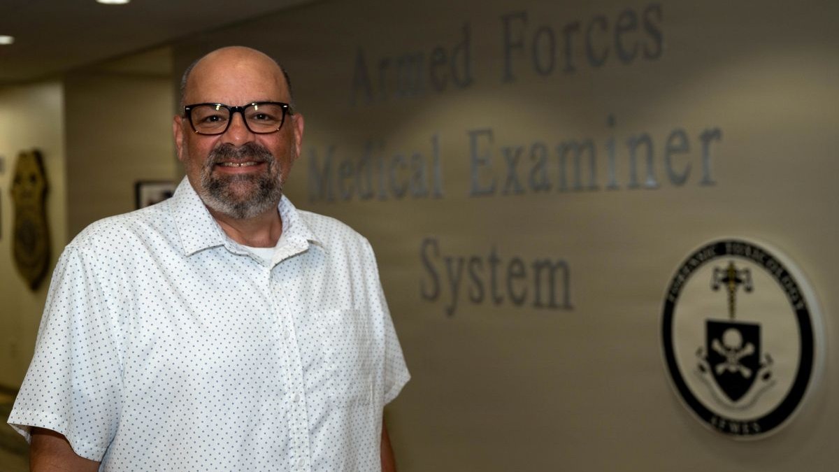 Mike Leone, Armed Forces Medical Examiner System Safety and Occupational Health Manager, poses for a photo on Dover Air Force Base, Delaware, July 22, 2026. By keeping the AFMES team safe, he plays a direct role in supporting all who bring answers, justice, and closure to military families. (U.S. Air Force photo by Staff Sgt. Stephanie Henry)