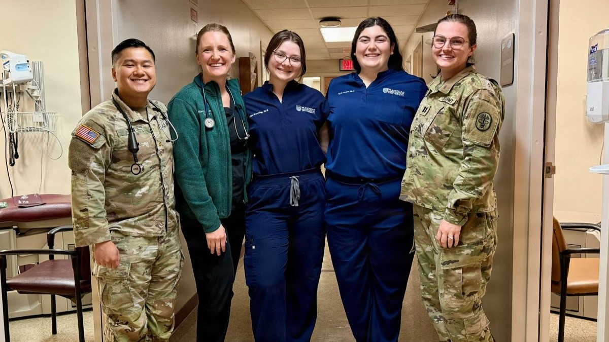 Bayne-Jones Army Community Hospital pediatricians and Franciscan Missionaries of Our Lady University physician assistant students gather in the Pediatric Clinic at Fort Polk, Louisiana, Aug. 26. From left are Maj. Benjamin H. Tan, chief of the Department of Pediatrics; Capt. Kiara Schein; PA student Miya Browning; PA student Tayler Hooper; and Capt. Hailey Buller. Browning and Hooper completed a required pediatric clinical rotation at BJACH Aug. 3-27 under the supervision of the pediatric team. BJACH has partnered with FranU since 2019 to provide clinical learning opportunities for future healthcare professionals.