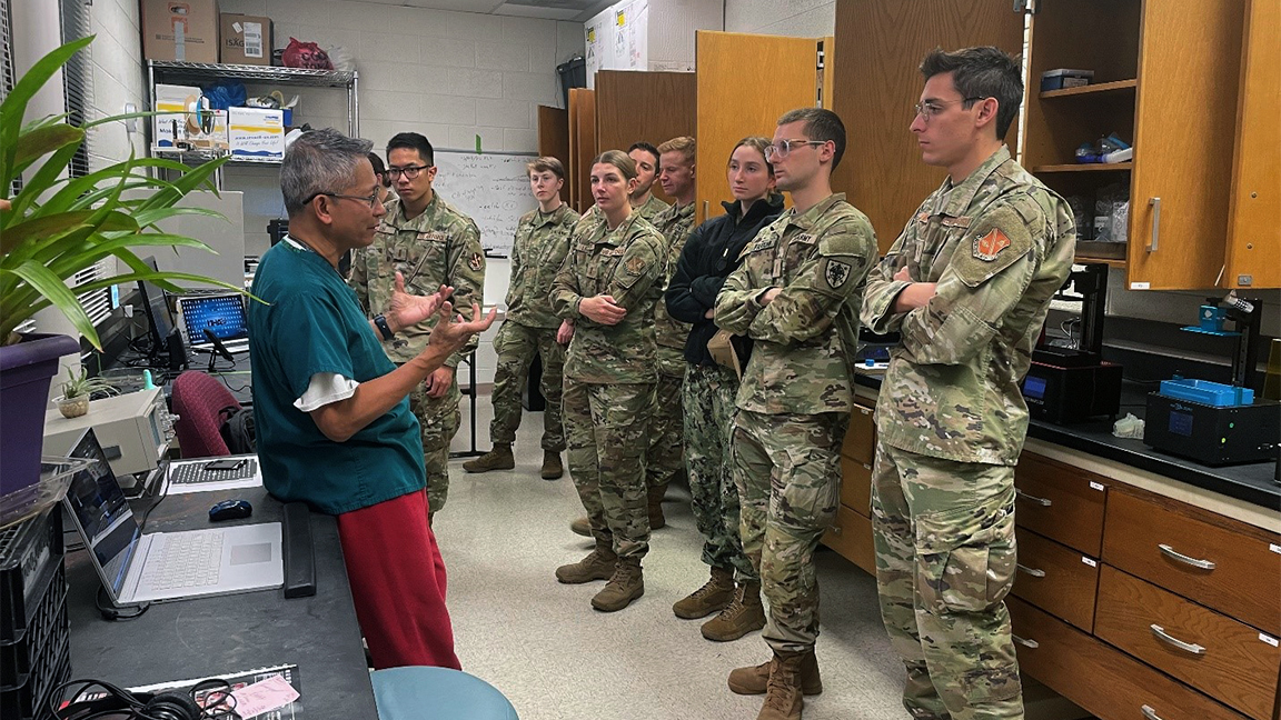 Dr. Rodrigo Mateo leads USU first-year medical students on an introductory tour of the MISL Lab. (Photo courtesy of U.S. Navy Ensign Robert Weishar, USU)